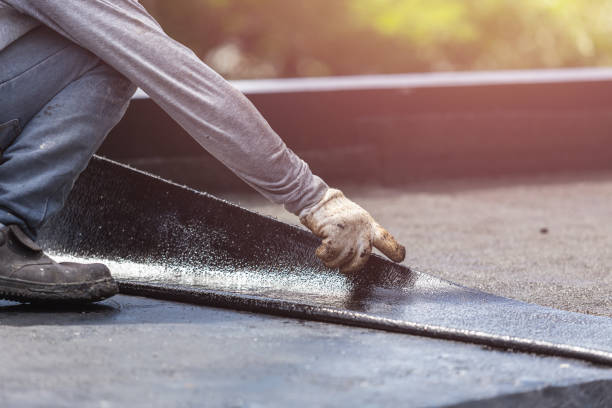 Professional Emergency Waterproofing technician working in Lake Grove, NY